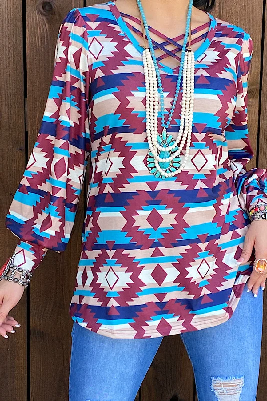 BQ11481 Multi color Aztec printed bubble sleeve blouse w/criss cross neckline Semi-Sheer Blouse
